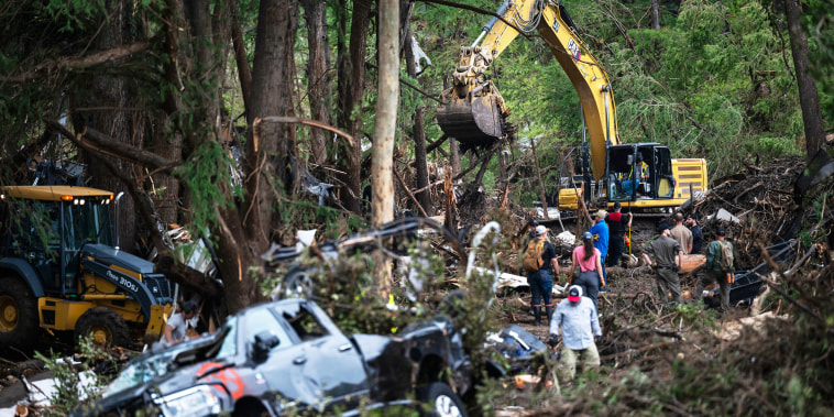 First responders carry out search and rescue operations