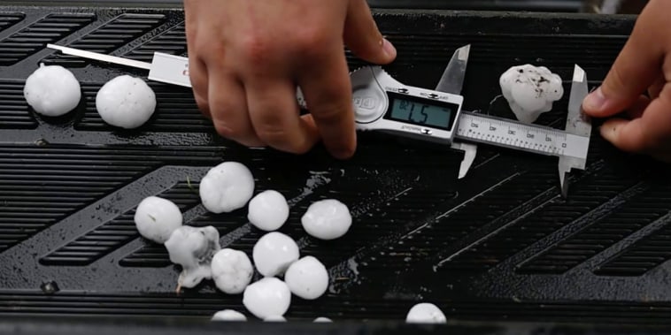 Hail is measured.
