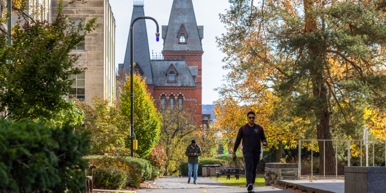 People walk through the Cornell University .
