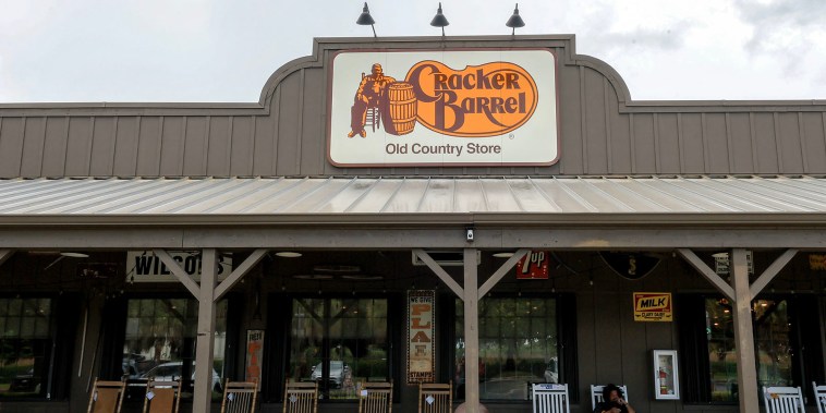 A Cracker Barrel sign featuring the old logo hangs on the outside of a restaurant on Aug. 21, 2025 in Homestead, Fla.