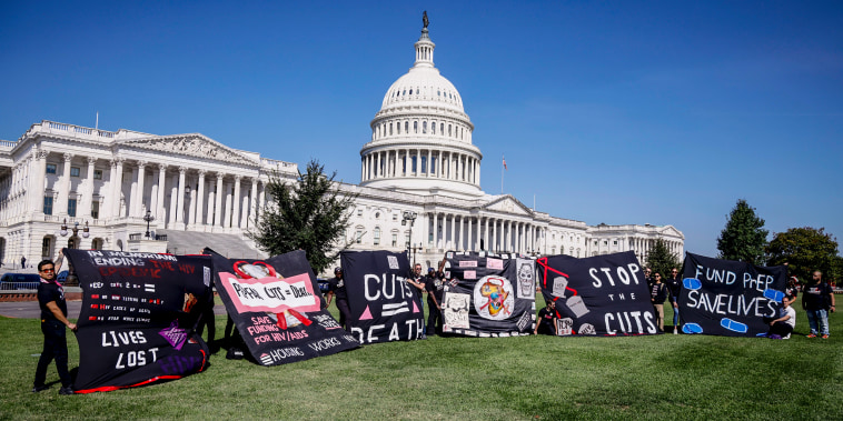 Image: Save HIV Funding Campaign Unveils #CutsKill AIDS Quilt