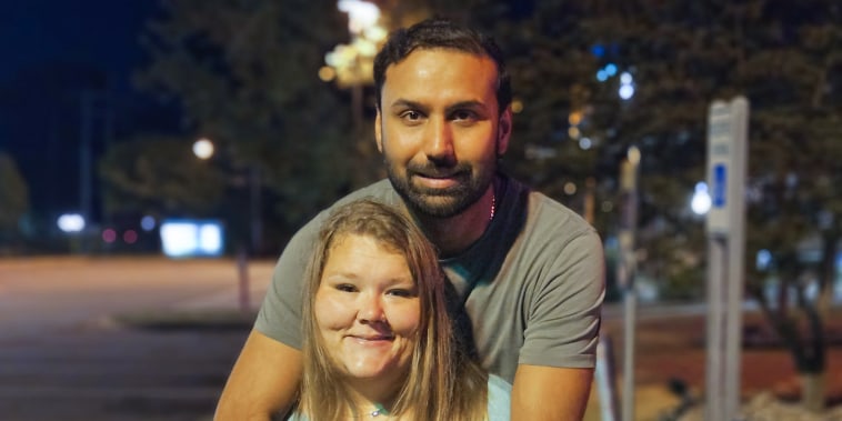 Kapil Raghu and his wife Ashley Mays.