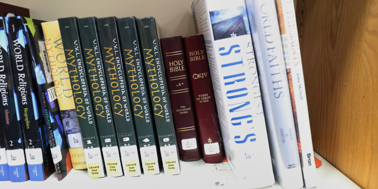 Bibles on library shelf