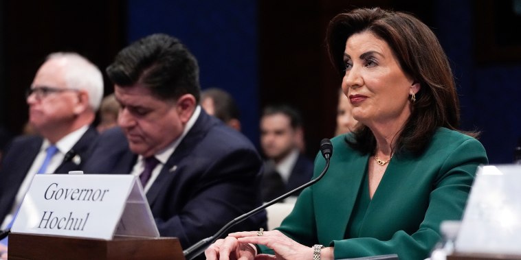 Minnesota Gov. Tim Walz, Illinois Gov. JB Pritzker and New York Gov. Kathy Hochul.