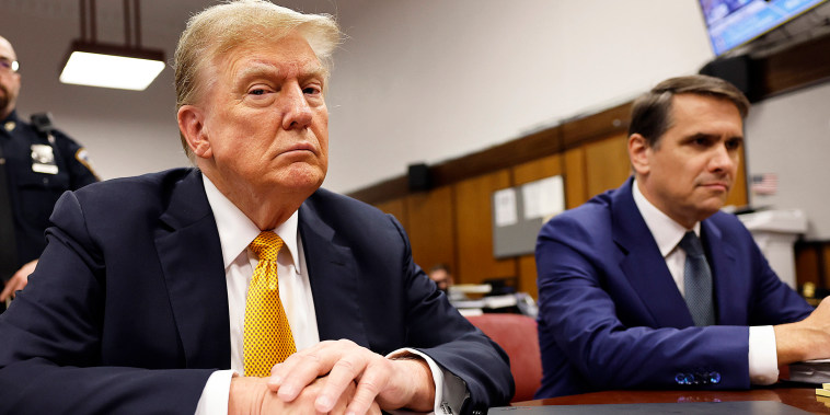 Donald Trump and Todd Blanche.