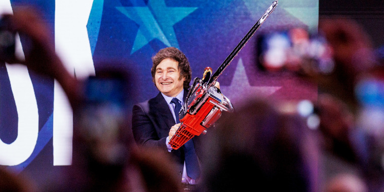Javier Milei holding a chainsaw.