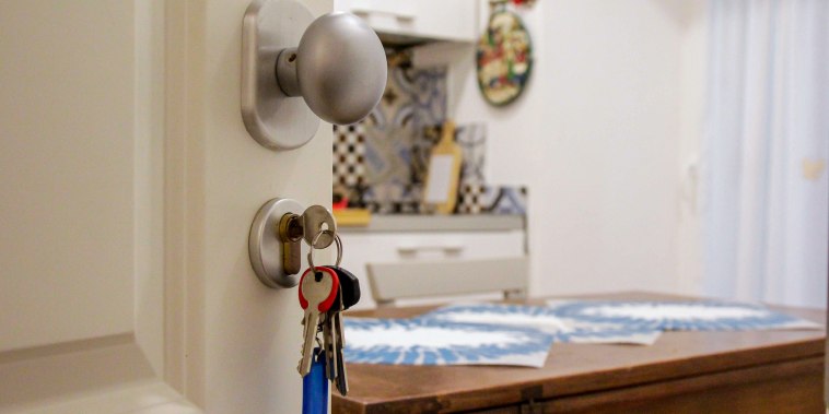 Apartment door open.