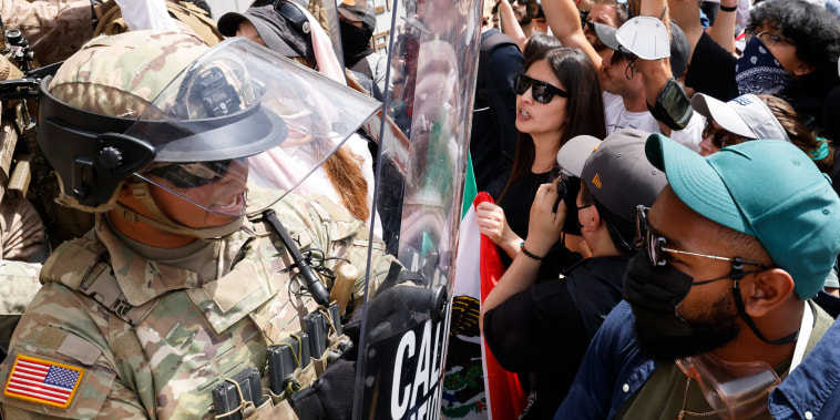 Marines push back anti-ICE protesters during "No Kings Day" in Los Angeles, C.A.