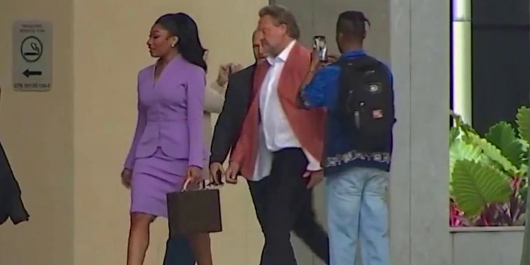 Megan Thee Stallion walks into court.