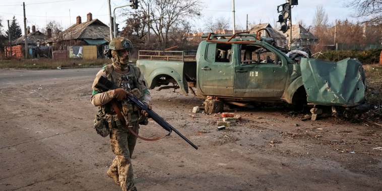 Ukrainian serviceman walks on a street in the frontline town of Kostiantynivka