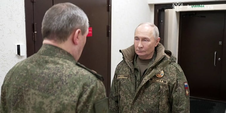 Russia's President Vladimir Putin visits a command post for the joint force grouping on Dec. 27, 2025.
