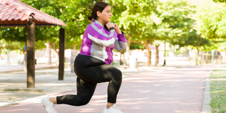 woman performing split squats