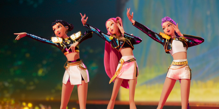 From left, Zoey, Mira, and Rumi sing on stage