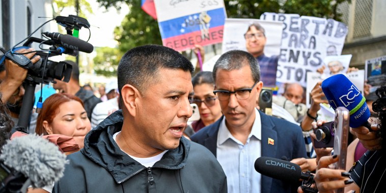 People and family members of detainees gather outside Venezuela's National Assembly