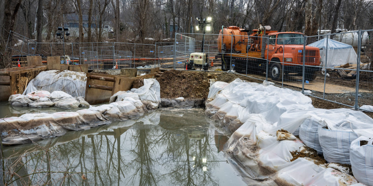 Emergency equipment is staged along the C&O Canal towpath.