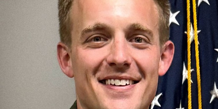 John A. Klinner smiles in a portrait