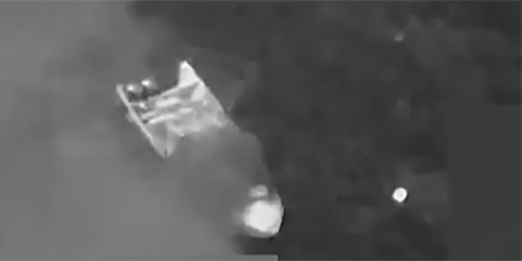 Smoke rises from a boat after a U.S. strike in the Eastern Pacific 