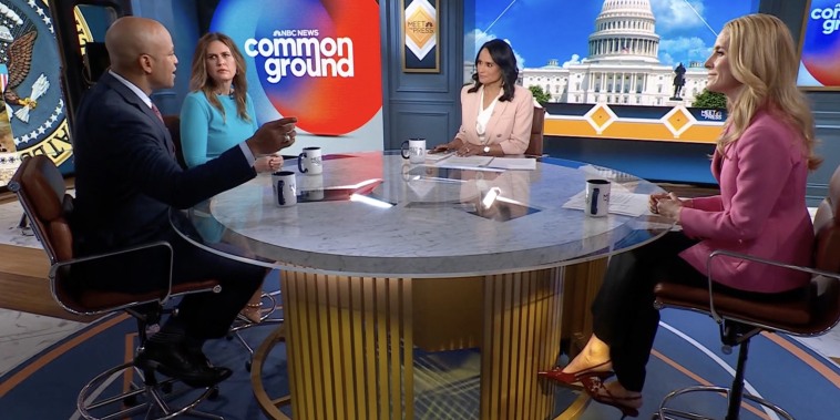 A video still of a "Common Ground" conversation in a television studio.