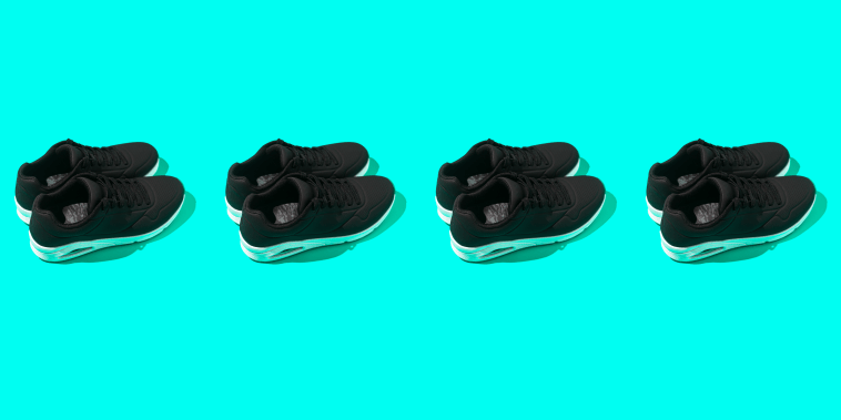 Pattern of black sneakers with air chambers, in a row, on a turquoise background. Sport, comfort, air chamber, walking, and casual.