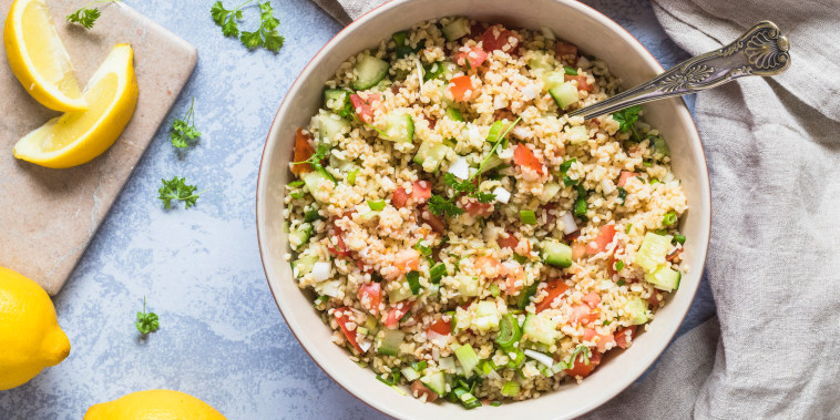 Tabouli taboleh salad with bulgur, tomato, cucumber, lemon and parsley