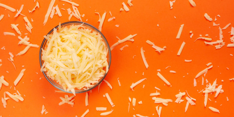 Grated cheese in the bowl.