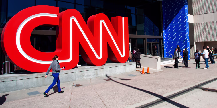 People walk outside CNN Center on Oct. 24, 2018, in Atlanta.