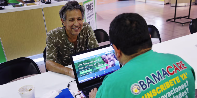 Image: People Sign Up For Health Care Coverage Under The Affordable Care Act During First Day Of Open Enrollment