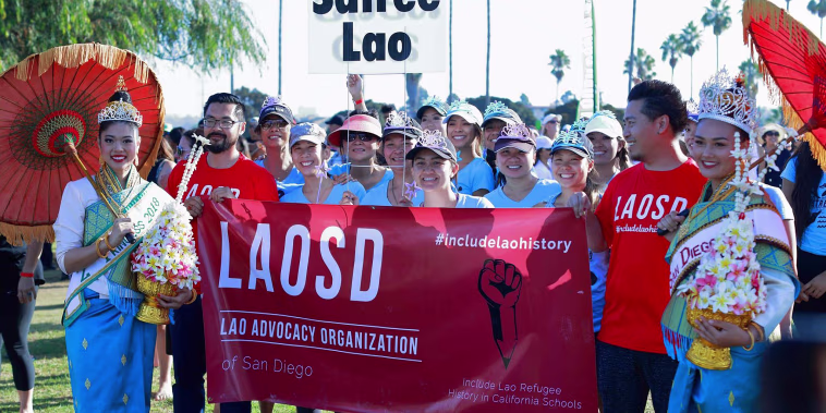 Members of LaoSD at a Lao boat racing festival.