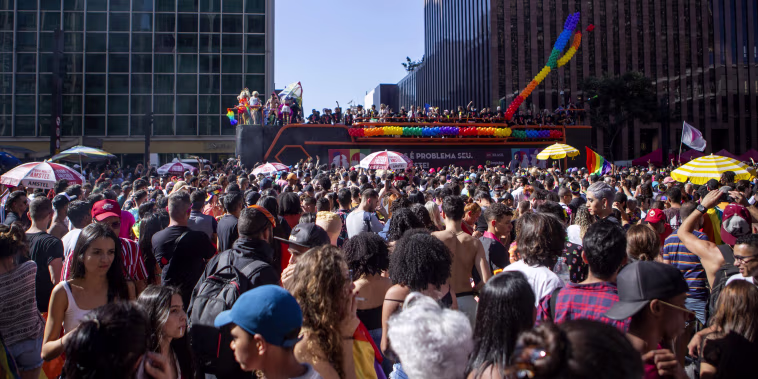 Image: People attend the Sao Paulo Pride Parade in Brazil on June 23, 2019.