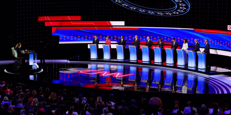 Image: Democratic 2020 U.S. presidential candidates pose together before the start of the second night of the second U.S. 2020 presidential Democratic candidates debate