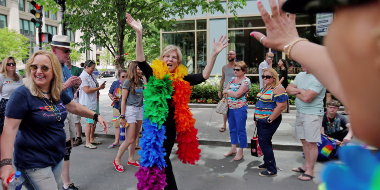 U.S. Senator Elizabeth Warren and musician Melissa Etheridge march in Boston's 48th Pride Parade in Boston
