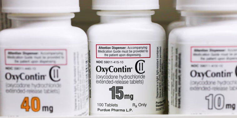 Bottles of Purdue Pharma L.P. OxyContin medication sit on a pharmacy shelf in Provo, Utah on  Aug. 31, 2016.