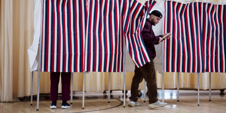 Voters cast their ballots in the New Hampshire primary on Jan. 22, 2024 in Laconia.