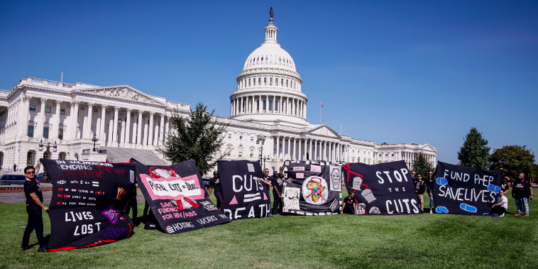 Image: Save HIV Funding Campaign Unveils #CutsKill AIDS Quilt