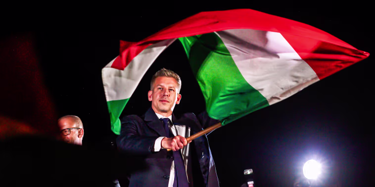 New Prime Minister of Hungary Peter Magyar waves a Hungarian