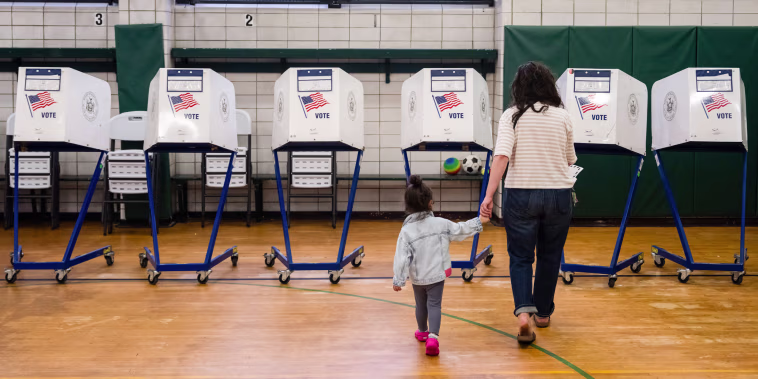 A voter arrives to cast their ballot at a polling location.