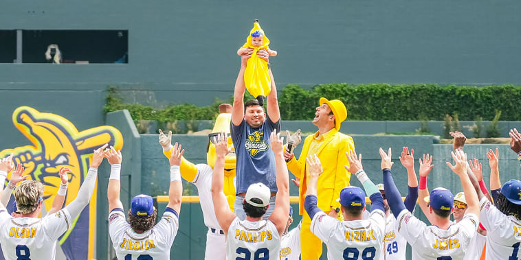 The Savannah Bananas have a 'Lion King' style baby ceremony before each baseball game. We're obsessed 