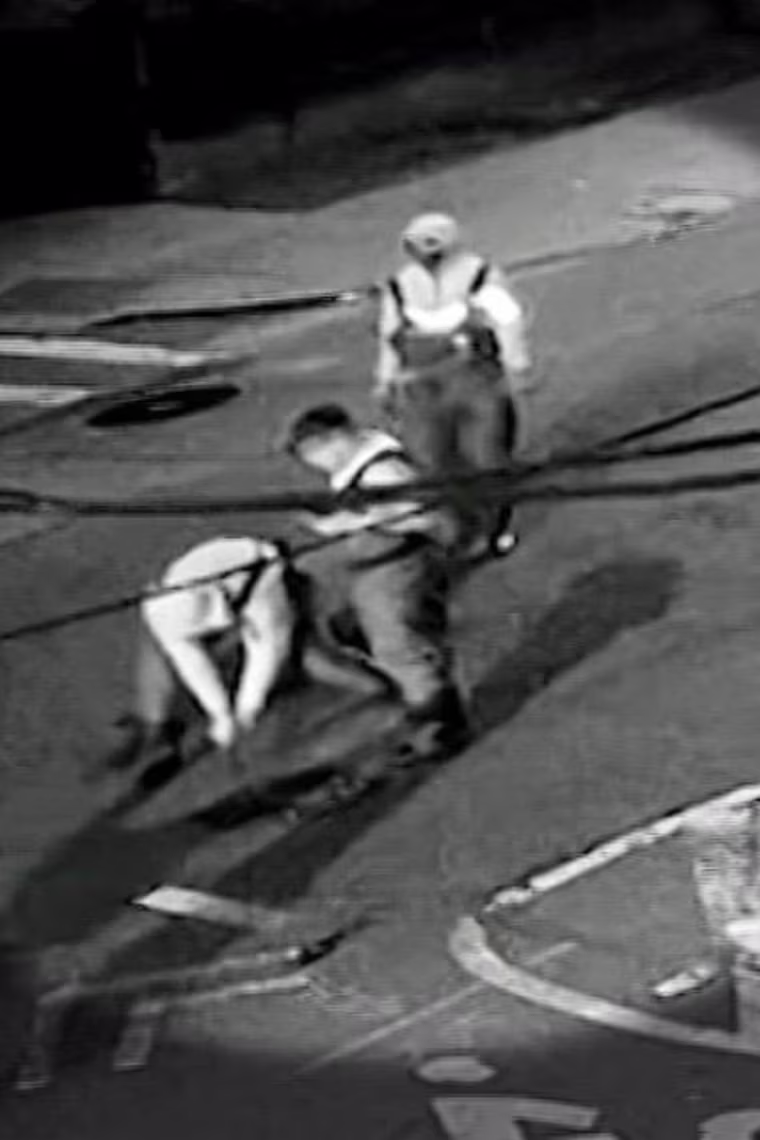 New video shows a group wearing hip waiters and carrying flash lights as they pry open a manhole cover on May 5th just before 2 a.m. in Astoria.