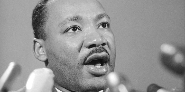 Image: Dr. Martin Luther King Jr., tells a press conference in Chicago