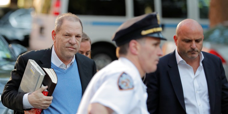 Image: Film producer Harvey Weinstein arrives at the 1st Precinct in Manhattan in New York