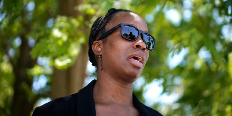 Image: John McAfee's wife Janice speaks briefly with journalists on leaving the Brians 2 penitentiary center, in Sant Esteve Sesrovires, near Barcelona, northeast Spain, on June 25, 2021.