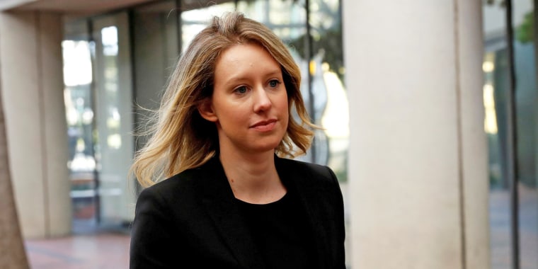 Image: Elizabeth Holmes arrives for a hearing at a federal court in San Jose