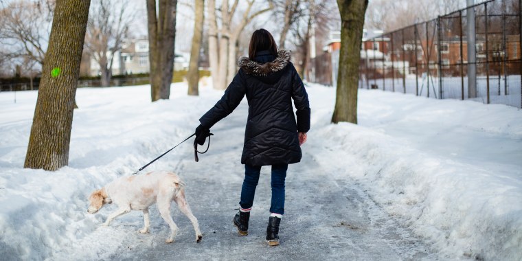 A woman and here dog