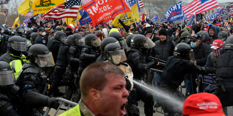 Image: Trump supporters clash with police outside of the Capitol in Washington on Jan. 6, 2021.