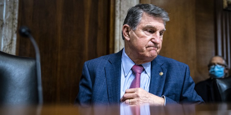Senator Joe Manchin, D-W.Va., and chairman of the Senate Energy and Natural Resources Committee, arrives during a hearing in Washington, D.C., on Feb. 1, 2022.