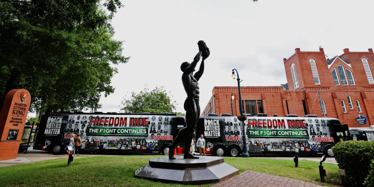 Image: People gather at Ebenezer Baptist Church during a stop on the Freedom Ride For Voting Rights in Atlanta