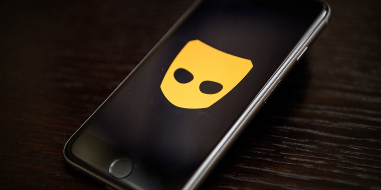 The "Grindr" app logo on a mobile phone screen.