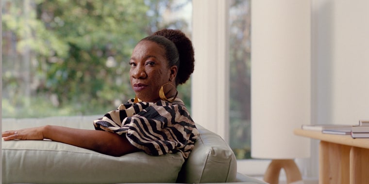 Tarana Burke sits for a portrait in Baltimore on Aug. 25, 2021.