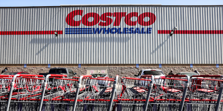 Shopping carts are lined up in front of a Costco store on Feb. 25, 2021 in Inglewood, Calif.