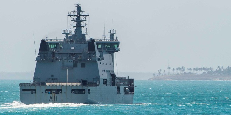 Image: Royal New Zealand Navy's HMNZS Aotearoa sails in the sea off the coast of Tonga